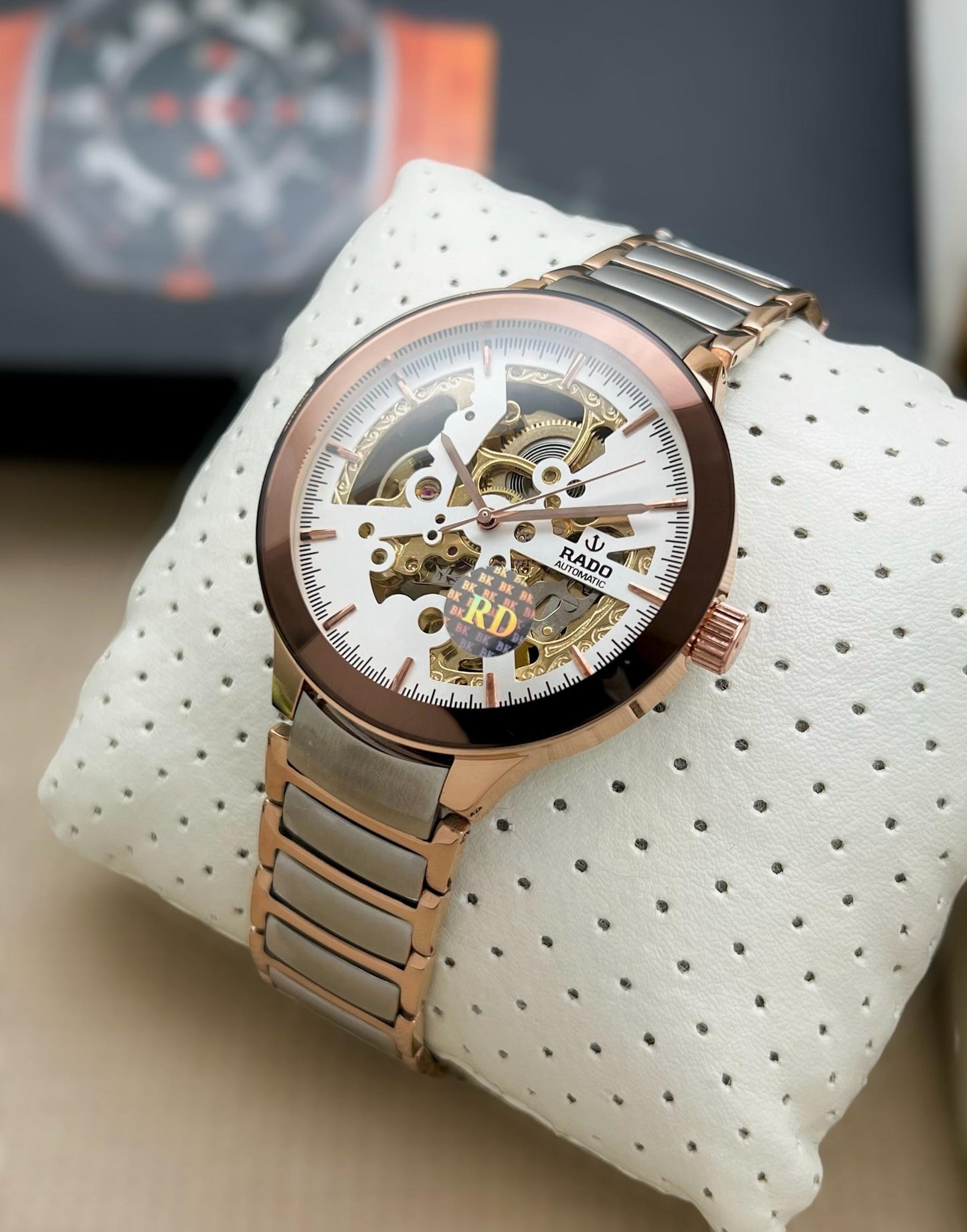 This Rado Automatic Jubilé watch exudes elegance with its exquisite skeleton dial, maurya watch