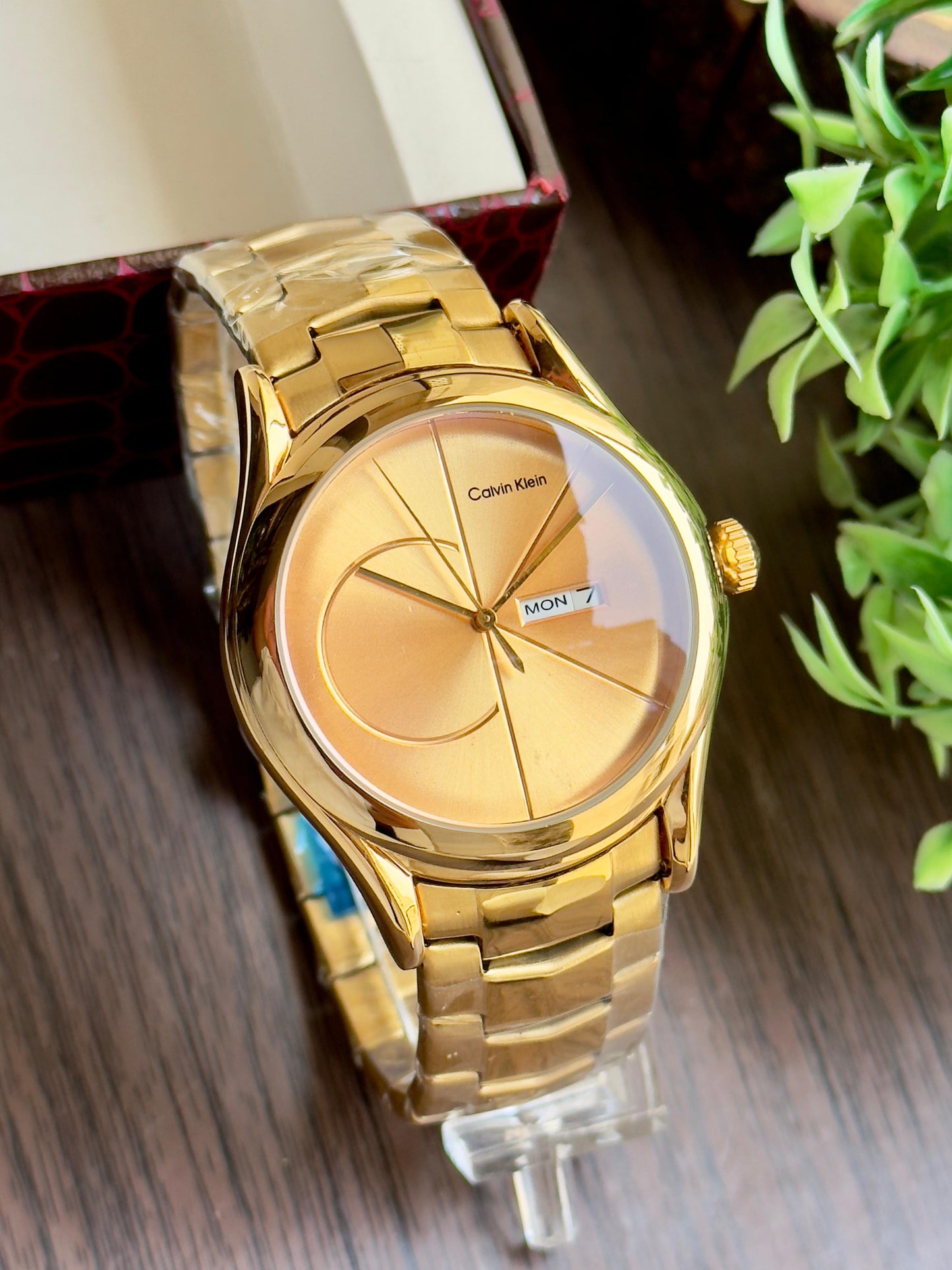 CK luxurious gold finish and sleek minimalist design. maurya watch