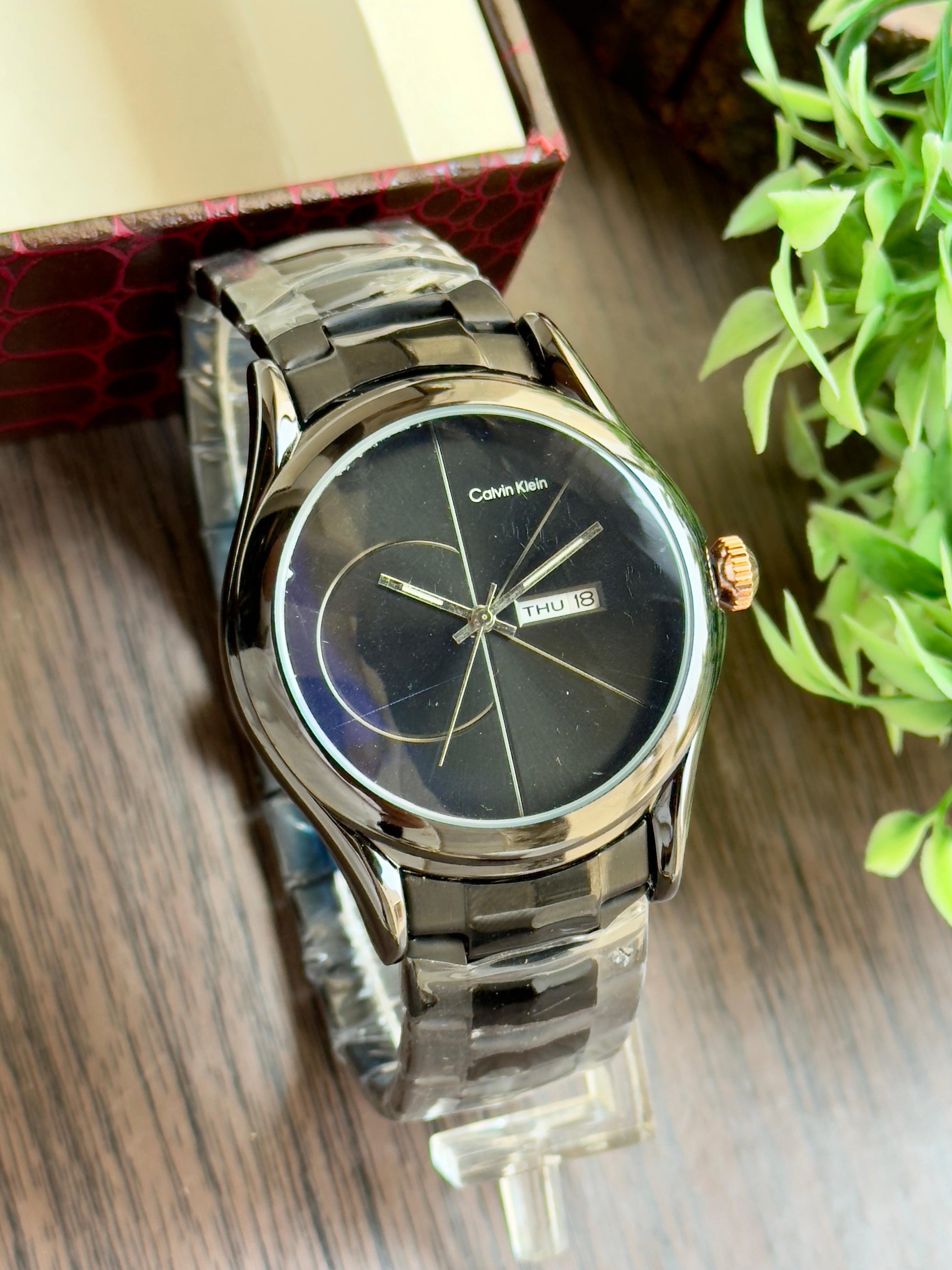 CK luxurious gold finish and sleek minimalist design. maurya watch