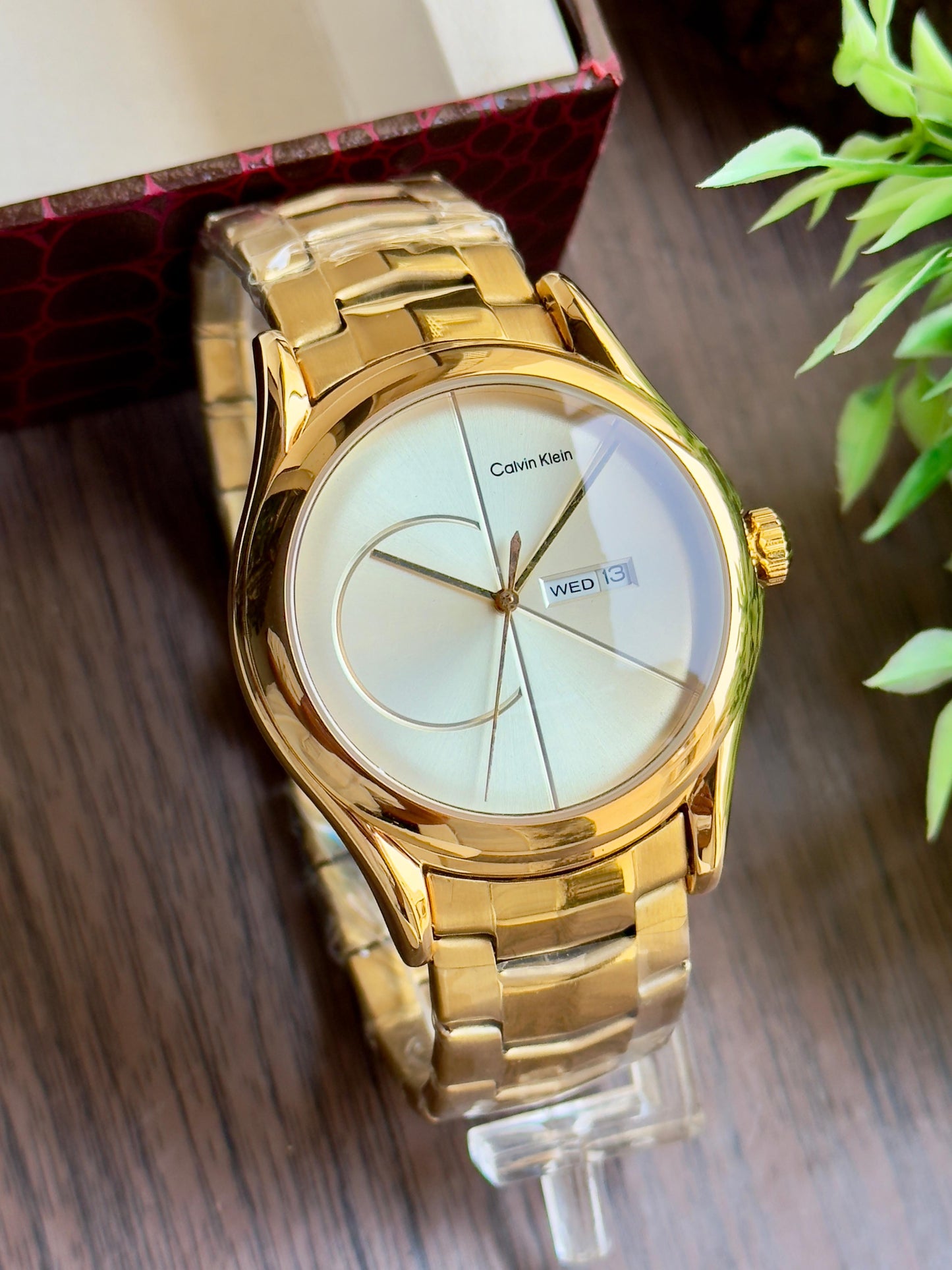 CK luxurious gold finish and sleek minimalist design. maurya watch