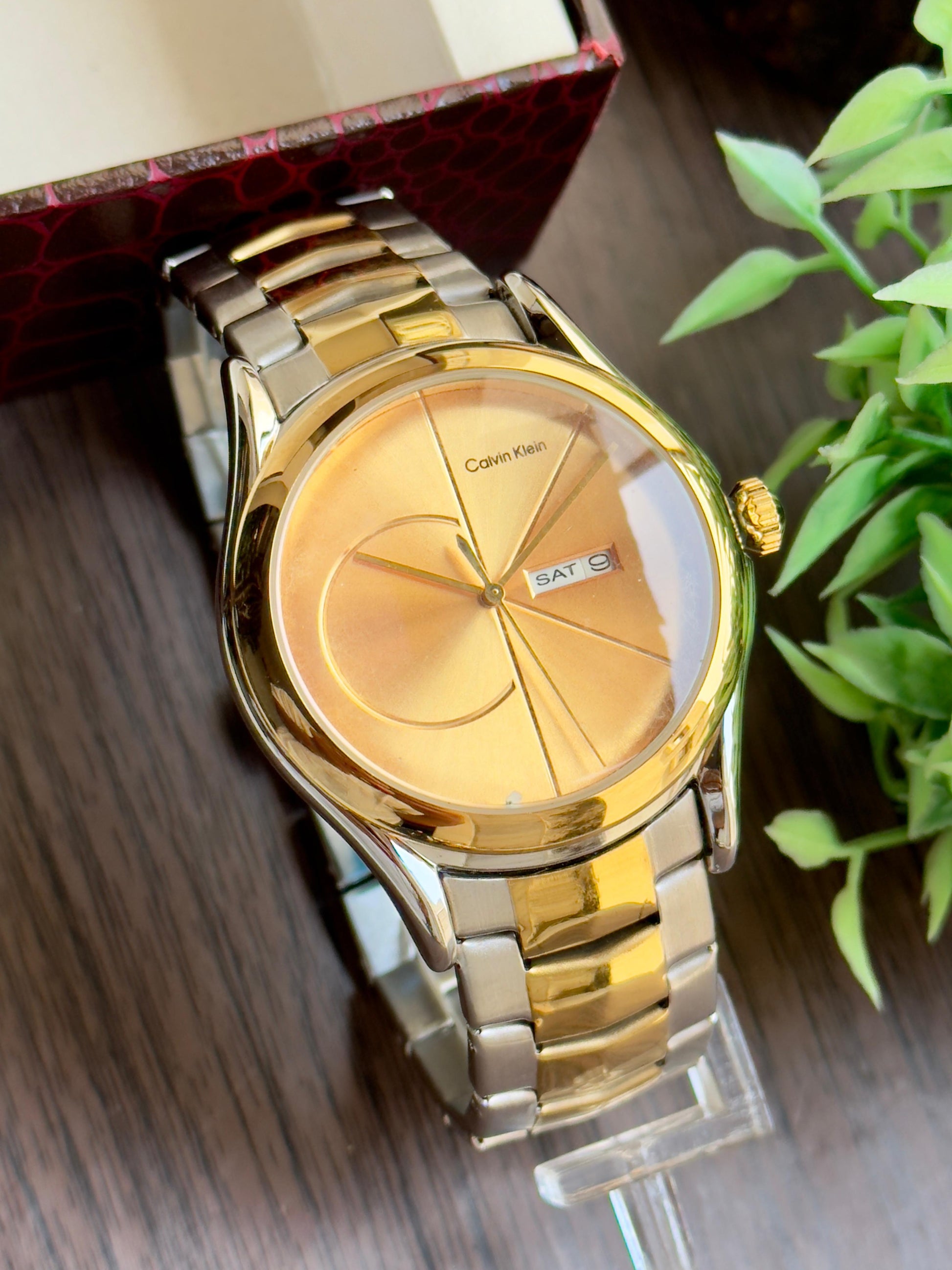 CK luxurious gold finish and sleek minimalist design. maurya watch