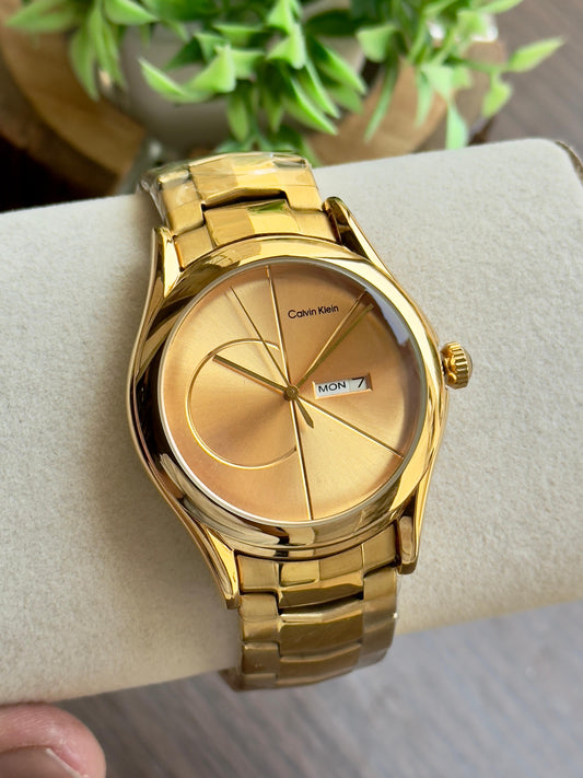 CK luxurious gold finish and sleek minimalist design. maurya watch